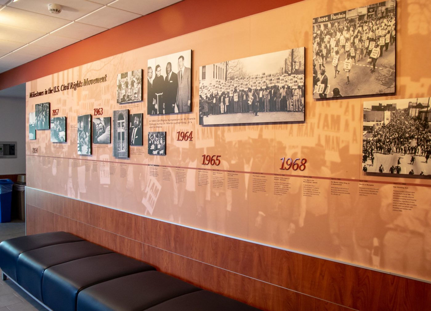 Milestones in the U.S. Civil Rights Movement exhibit wall with historical photographs and timeline