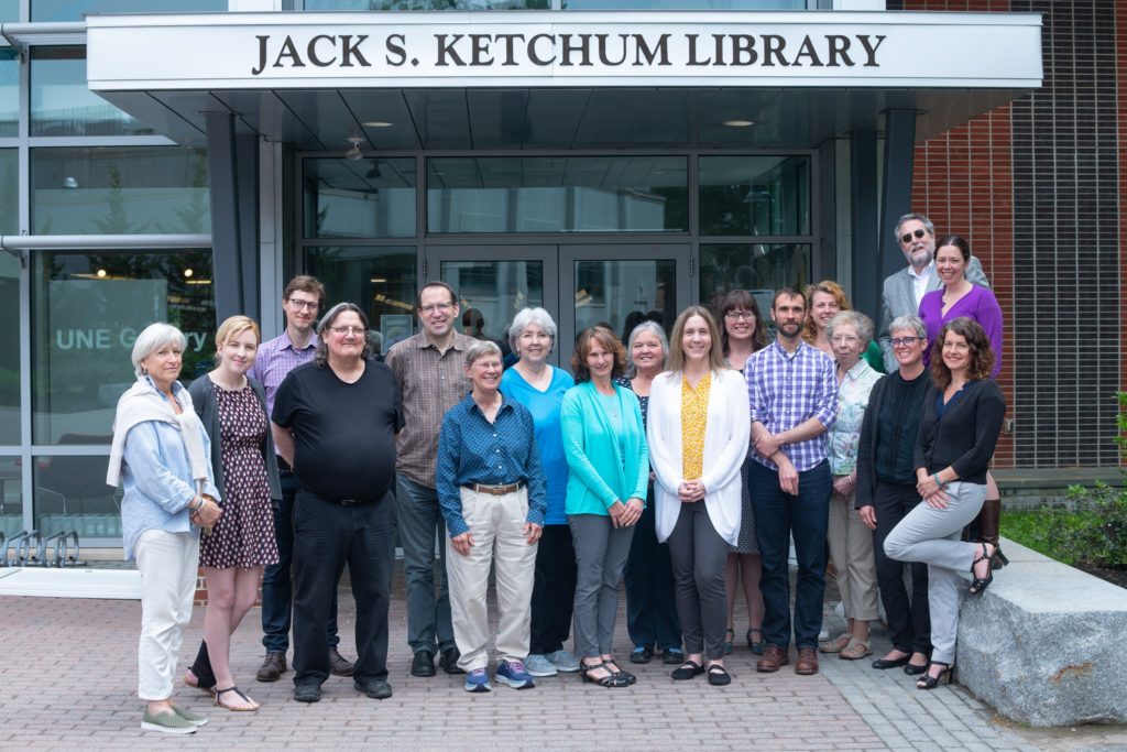 library staff gathered in front of the Ketchum Library front entrance.